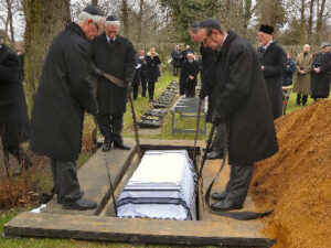 Remains of seventeen members of a slaughtered Jewish family found in a well in Norwich, were recently reburied in the Jewish cemetery